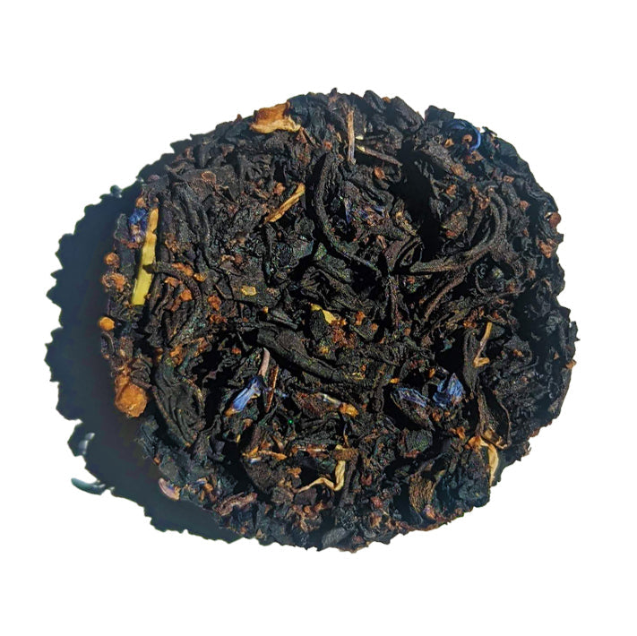 Close up of tea disc with a white background